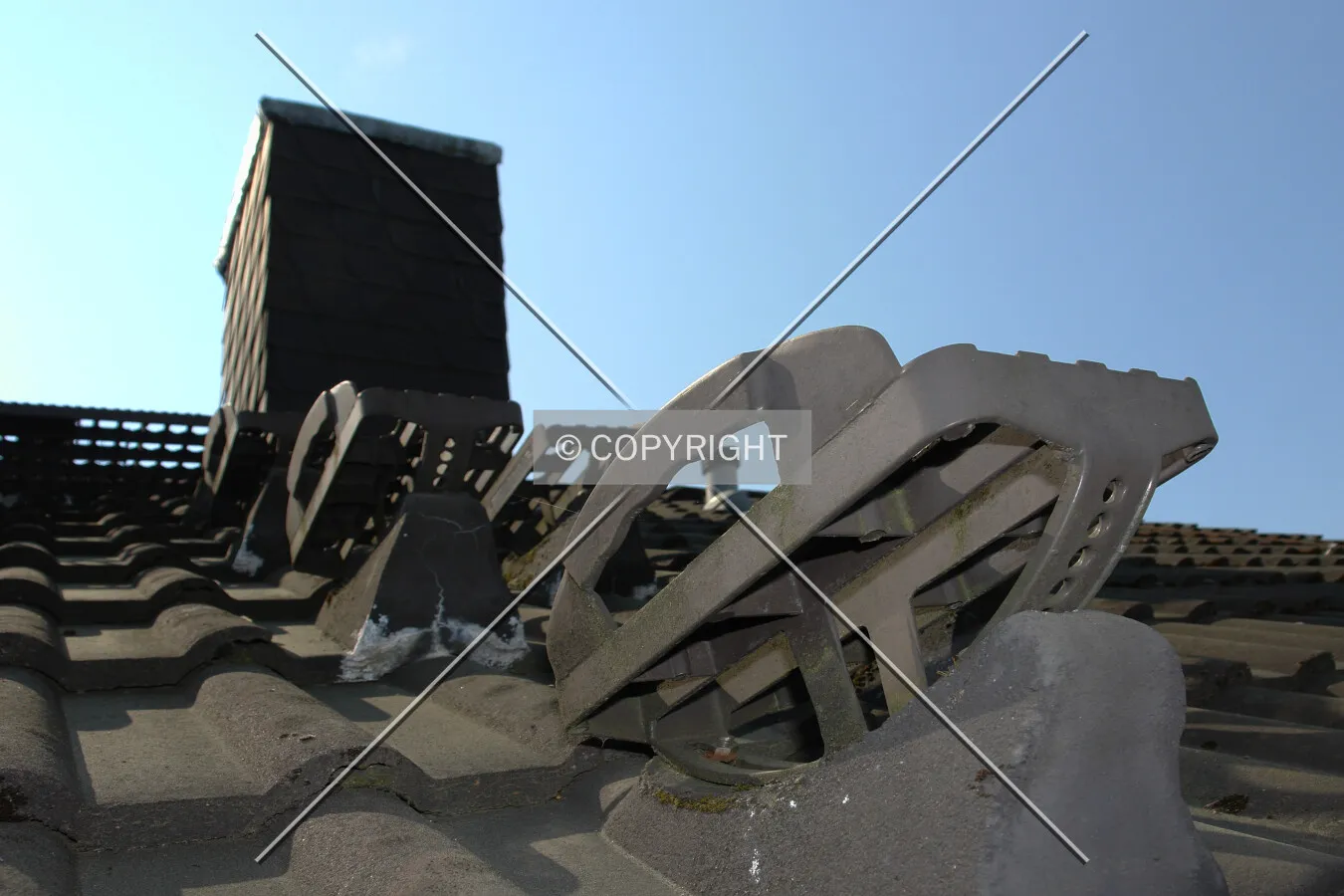 Steps to a stack on top of a roof