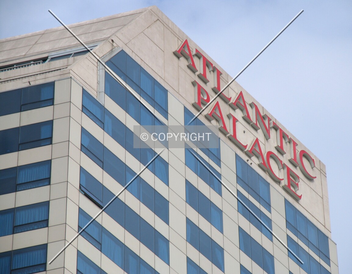 Top and large building sign from the northeast
