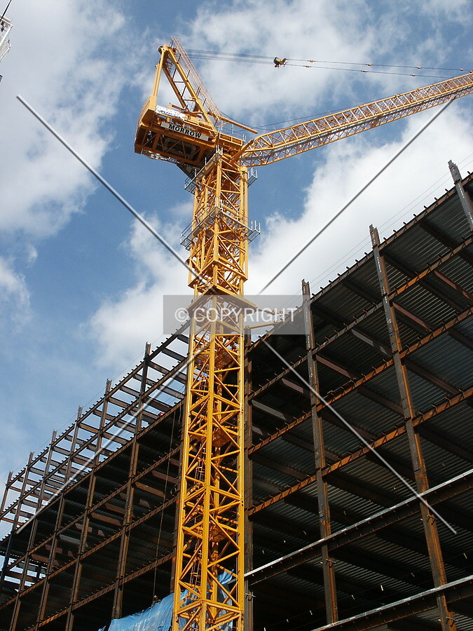 Crane reaching over the structure