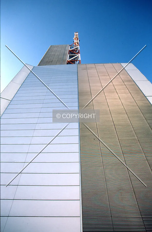 Looking up at the antenna from highest rooftop of the building