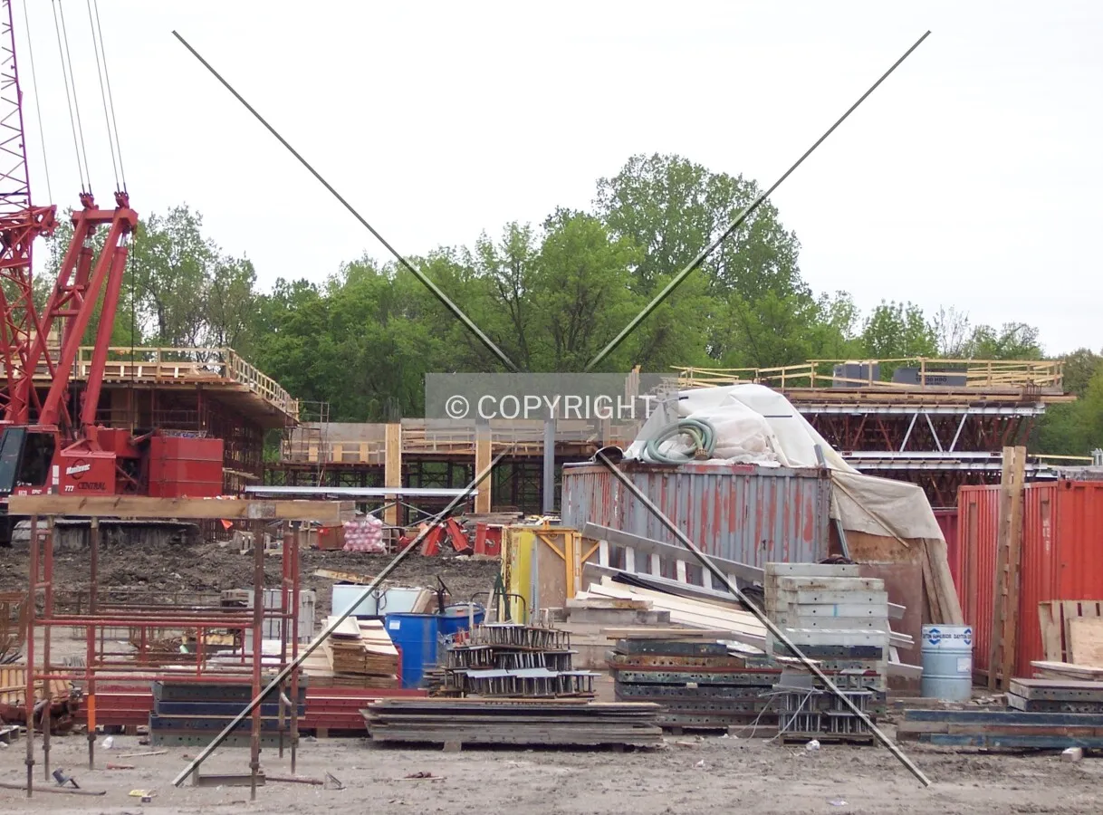 Construction materials and debris in front of the Oak Tower