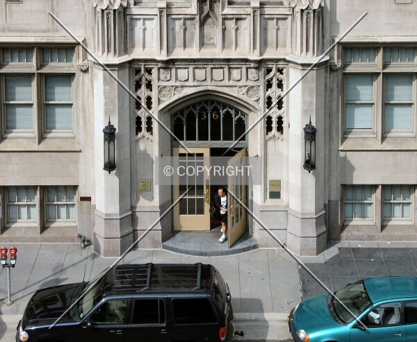 Resident leaving by the main entrance