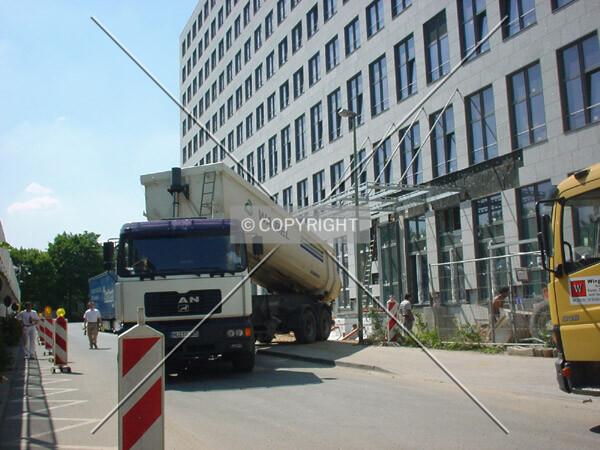 Truck is unloading sand