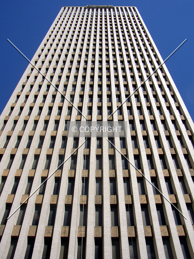 Looking up the southern facade from Polk Street below