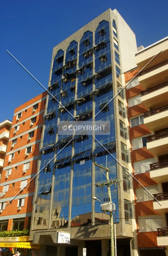 Looking up from across José Picoral Street