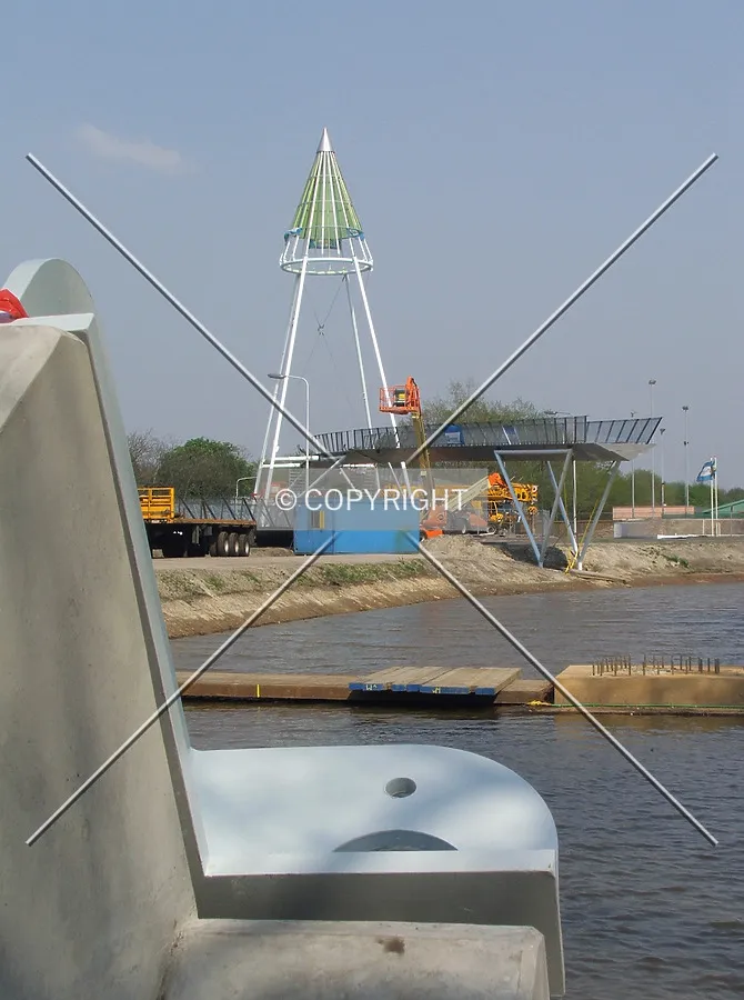 Unfinished bridge and an anchor for the suspension bridge in front