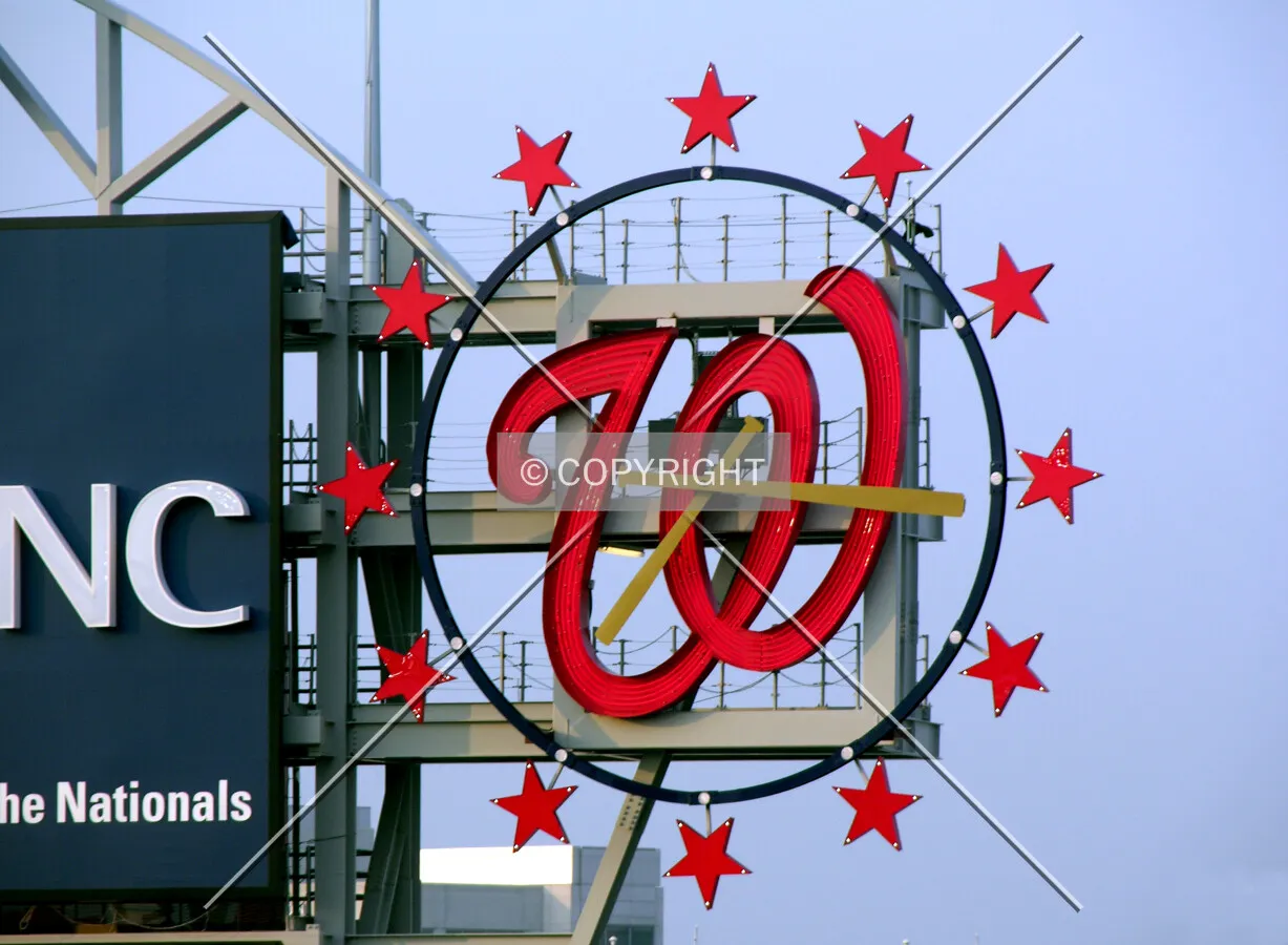 Scoreboard clock utilizing baseball bats at the National logo