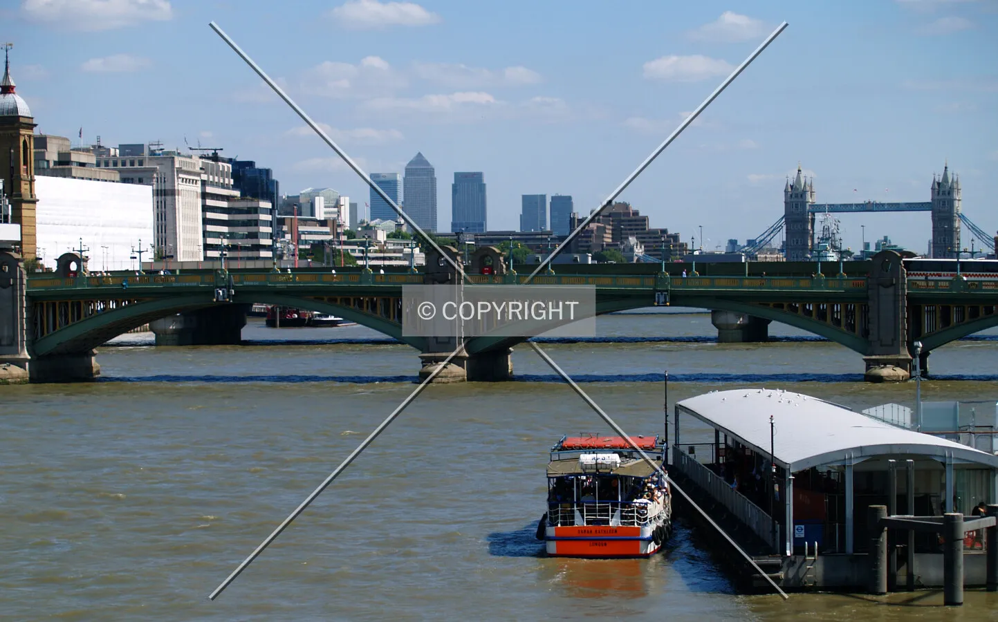 Looking toward the east from Millenium Bridge with Canary Wharf in the middle