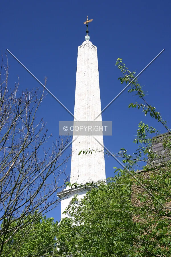 The distinctive obelisk spire rising above its surroundings