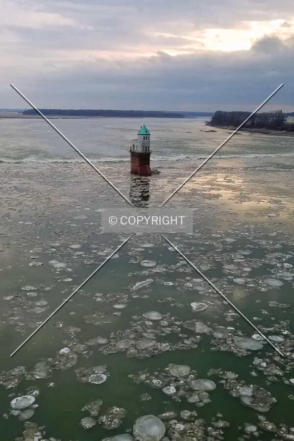 Surrounded by floating ice from the Old Chain of Rocks Bridge to the north; January 21, 2018