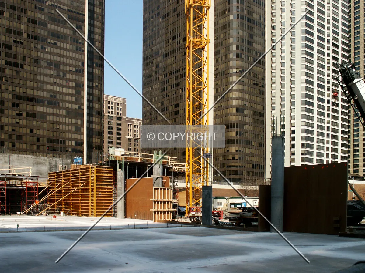 Base of the tower crane and ground level concrete flooring