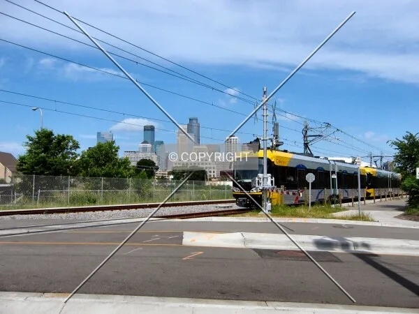 Skyline view from the Cedar-Riverside Station, Metro Transit Hiawatha Line train heading into downtown