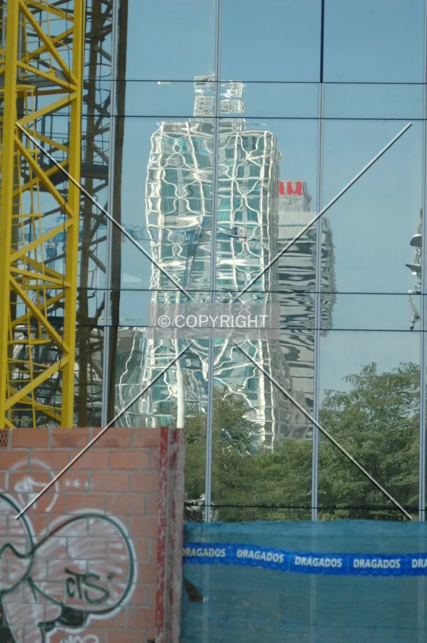 Skyscraper's reflections on the building's glass facade