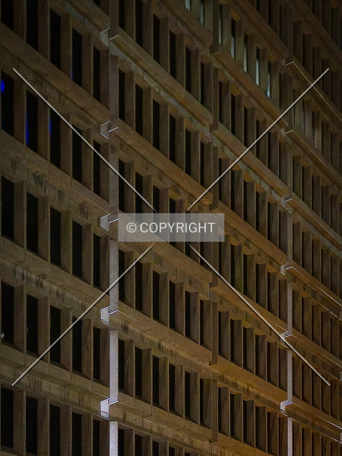 Facade detail at night, Sunday, July 12, 2026