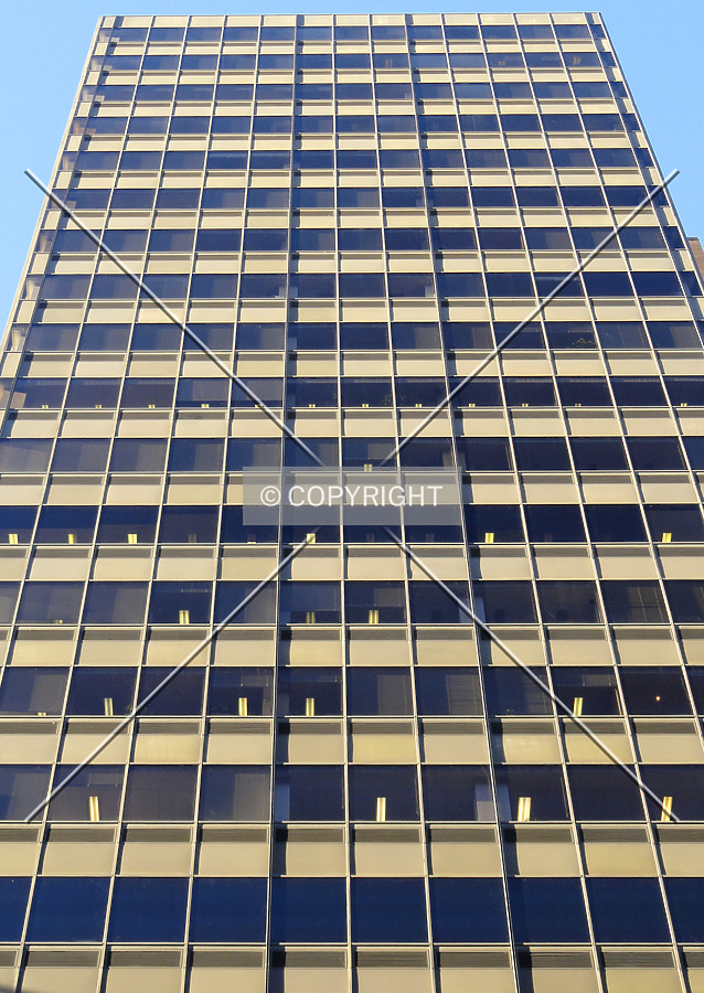 Looking up from McGill College Avenue