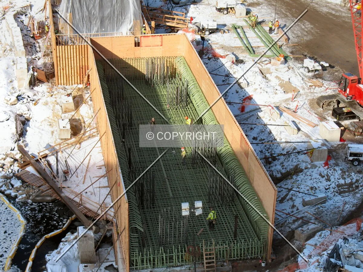 Construction workers working on rebar for Pier 3 supporting northbound lanes