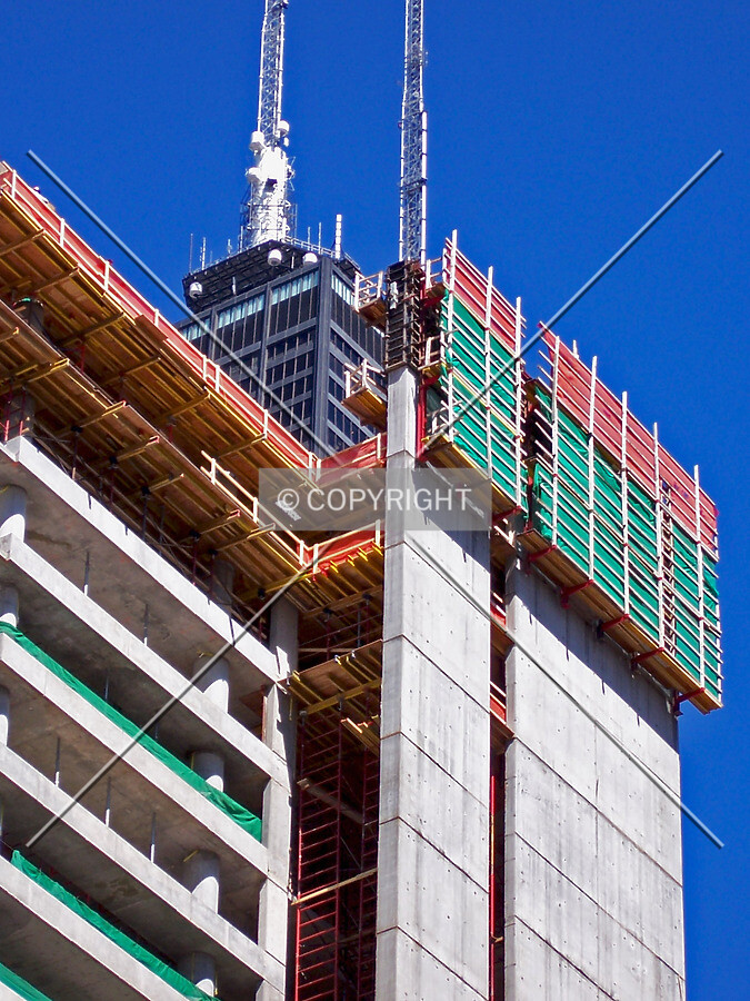 South side of the tower viewed from the southwest, with the John Hancock Center in the background