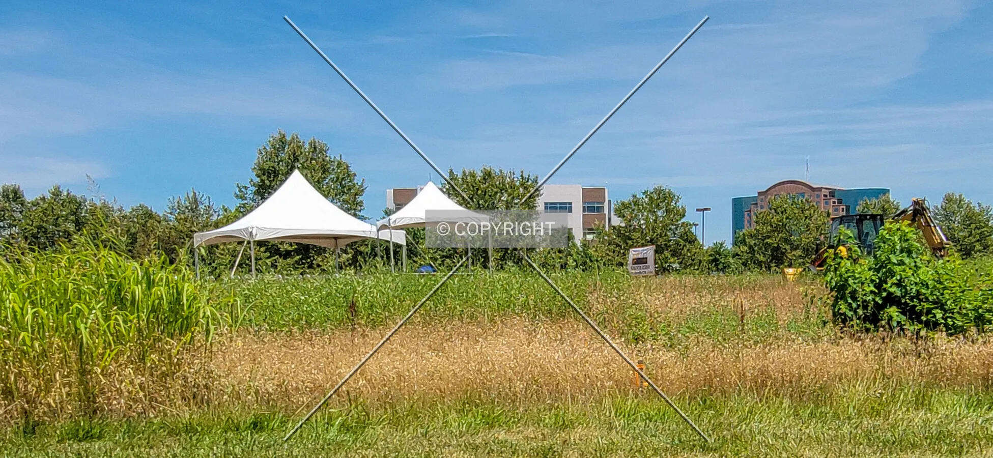 South view of tents set up for the groundbreaking ceremony; June 22, 2021