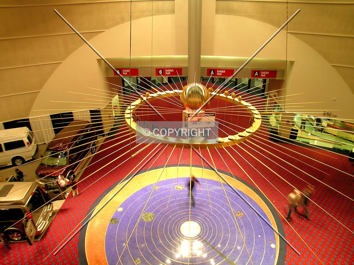 Looking down through the bronze pendulum from the second level