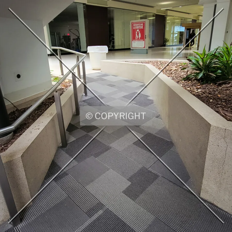Ramp to the first-floor seating area in front of the former Dillards Department Store; October 28, 2023
