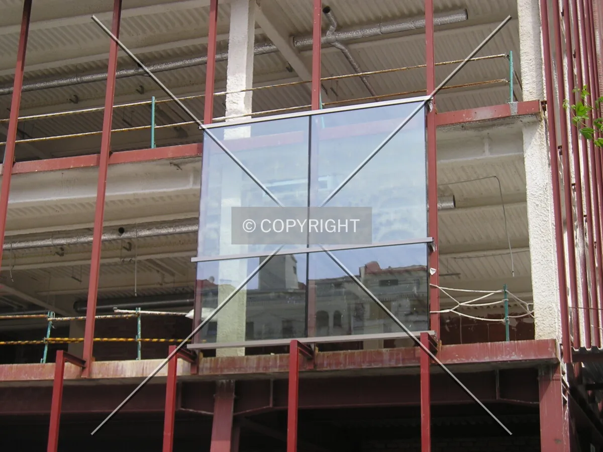 First pieces of the facade being installed