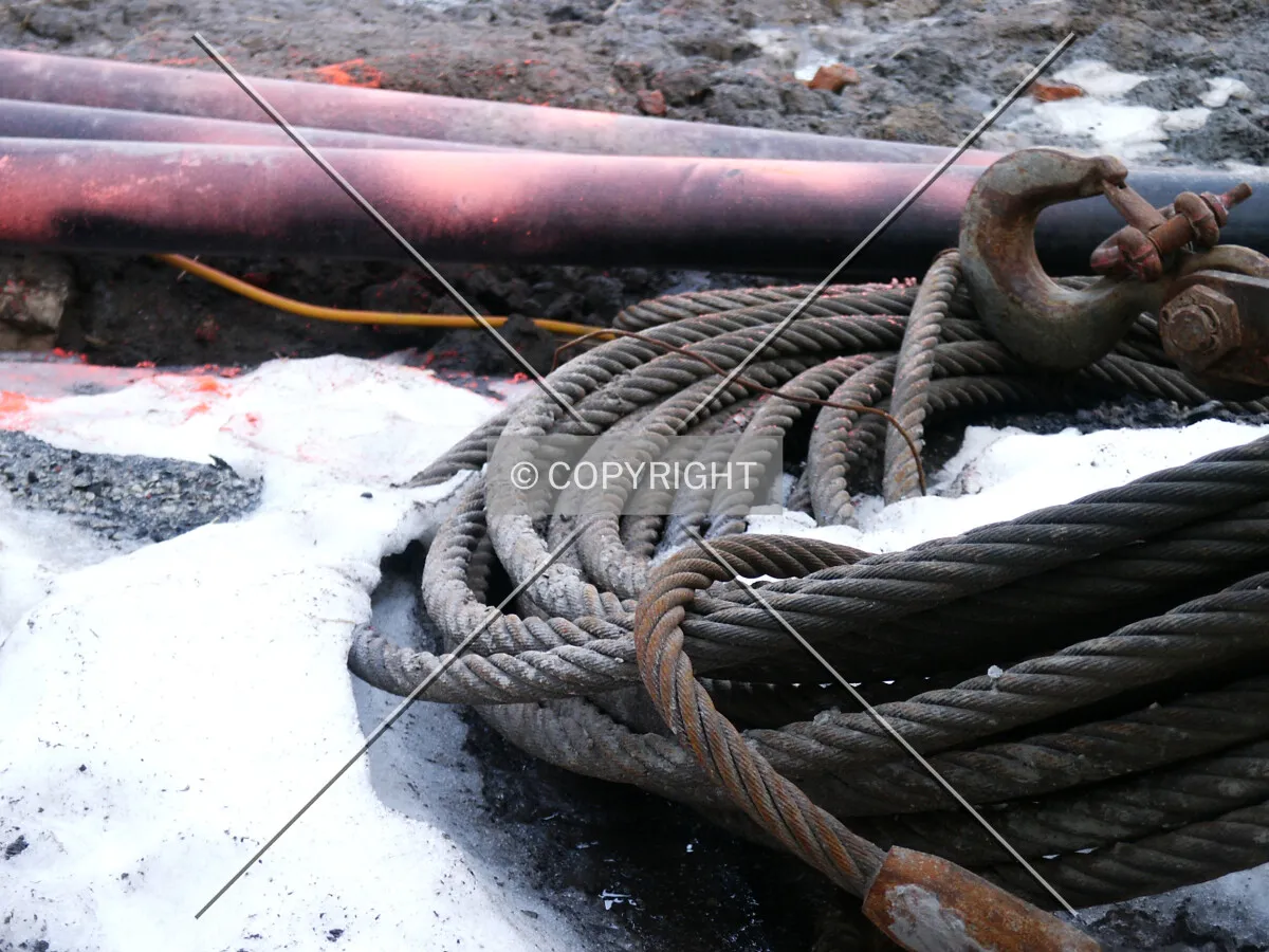 Cable coil in the snow by the west side
