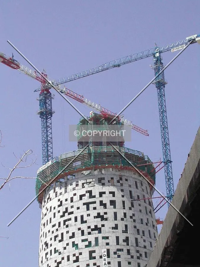 View of the top of the building and its cranes
