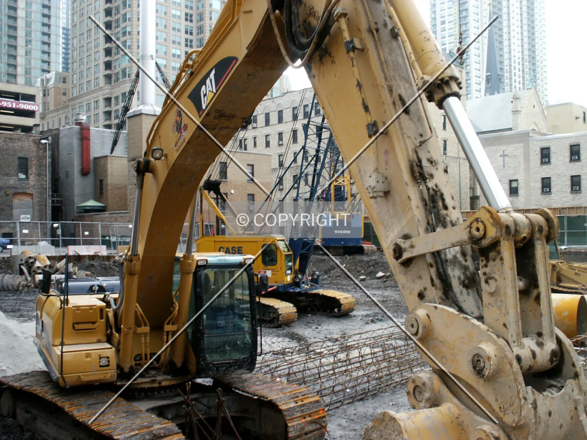Backhoe and foundation cranes from the northeast corner