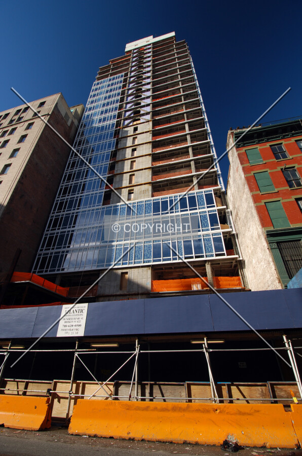 Looking up from Lafayette Street