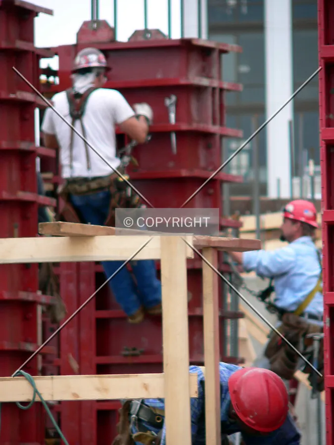 Workers checking the formwork