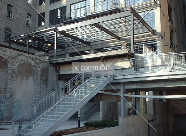 Staircase to West River Parkway, Rear Entrance, and Garage Entrance