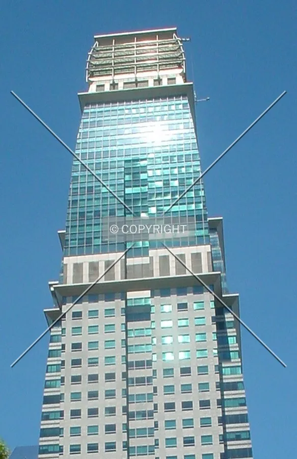 The reflective exterior cladding of the tower's upper floors taken from Maxwell Road