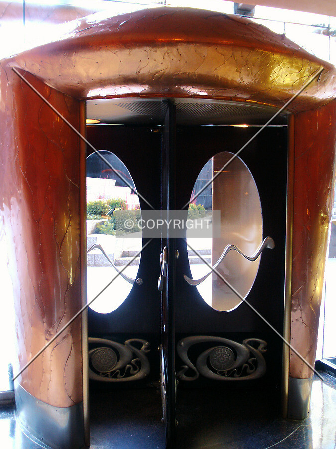 Revolving doorway to the Cheesecake Factory restaurant