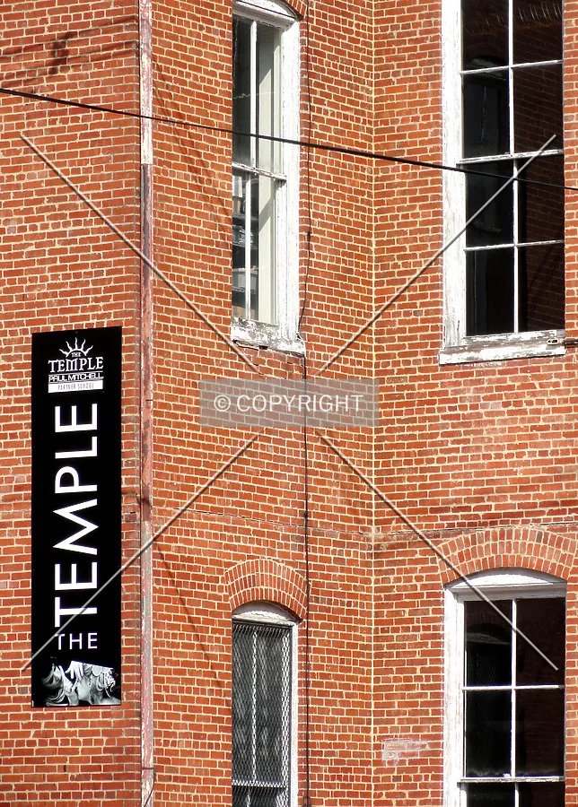 Western facade detail and signage