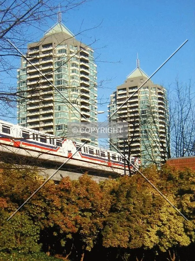 Tower on the left with SkyTrain on February 4, 2003