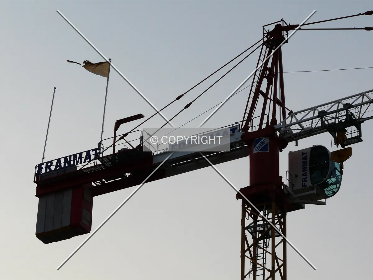 The tower crane at sunset