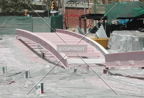 Another steel element of the dome being painted on the street