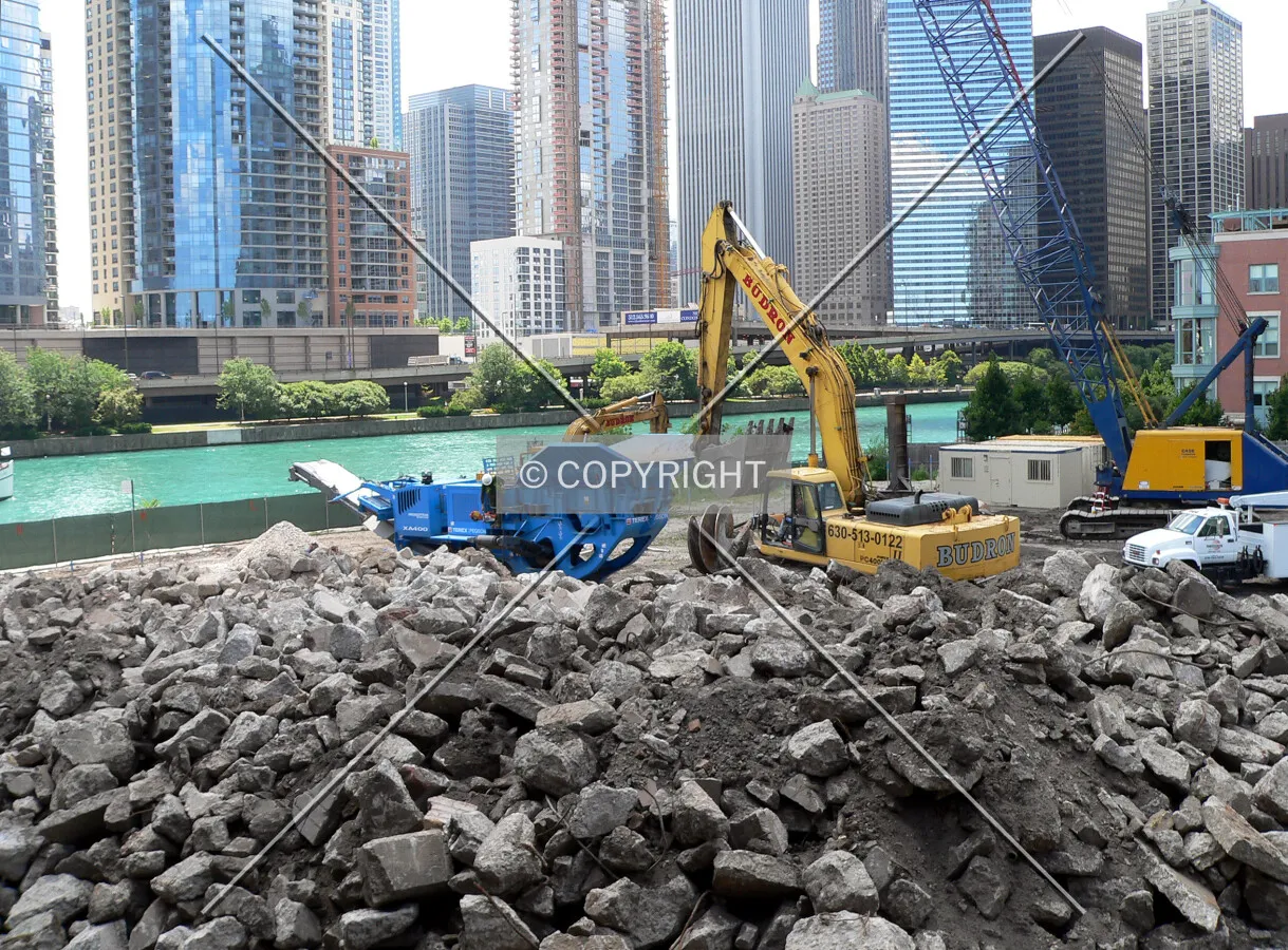 Concrete excavated from the site that has broken apart