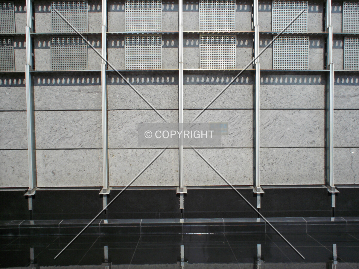 The facade at the base of Jin Mao Skyscraper