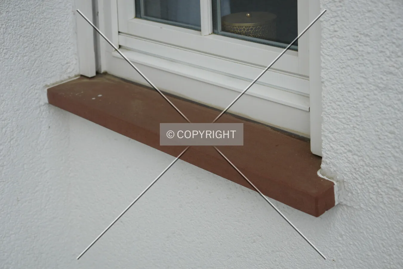 A sandstone window sill