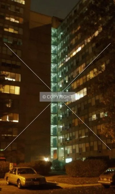 The glass walkways connecting the two wings, from the south at night