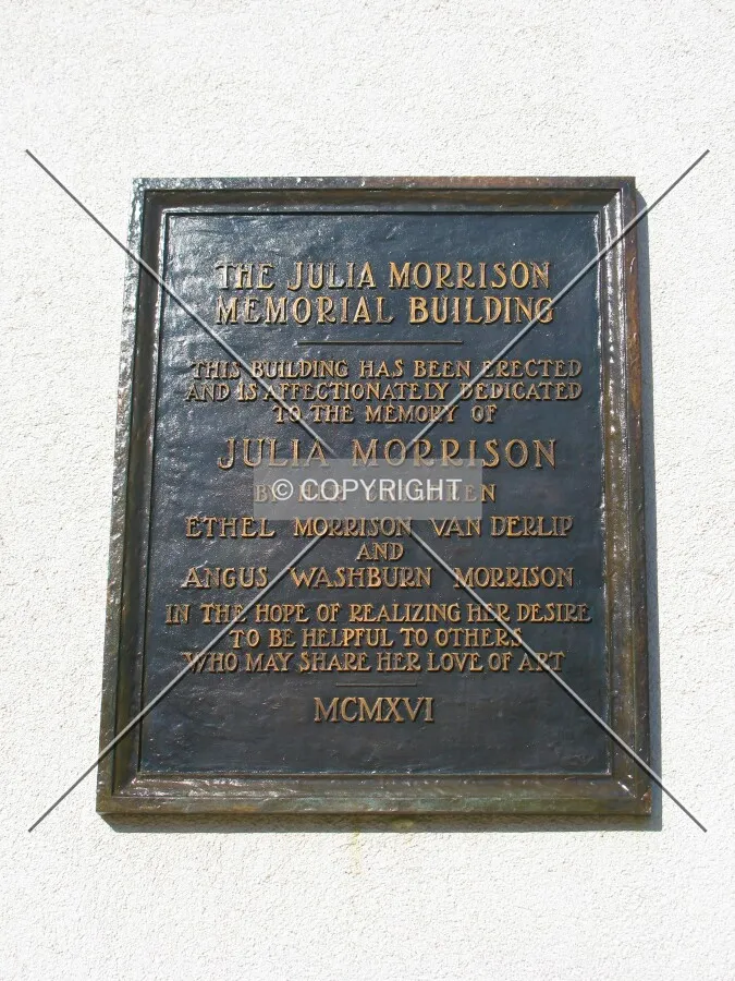 Plaque to left of main entrance