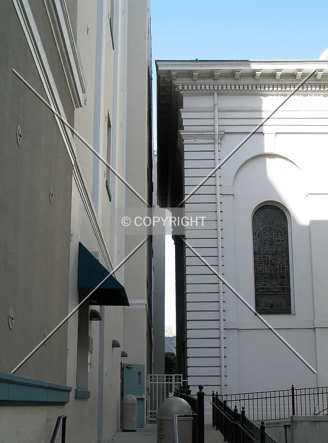 The Cathedral leans slightly north, leaving only inches between its roof and the facade of its northerly neighbor