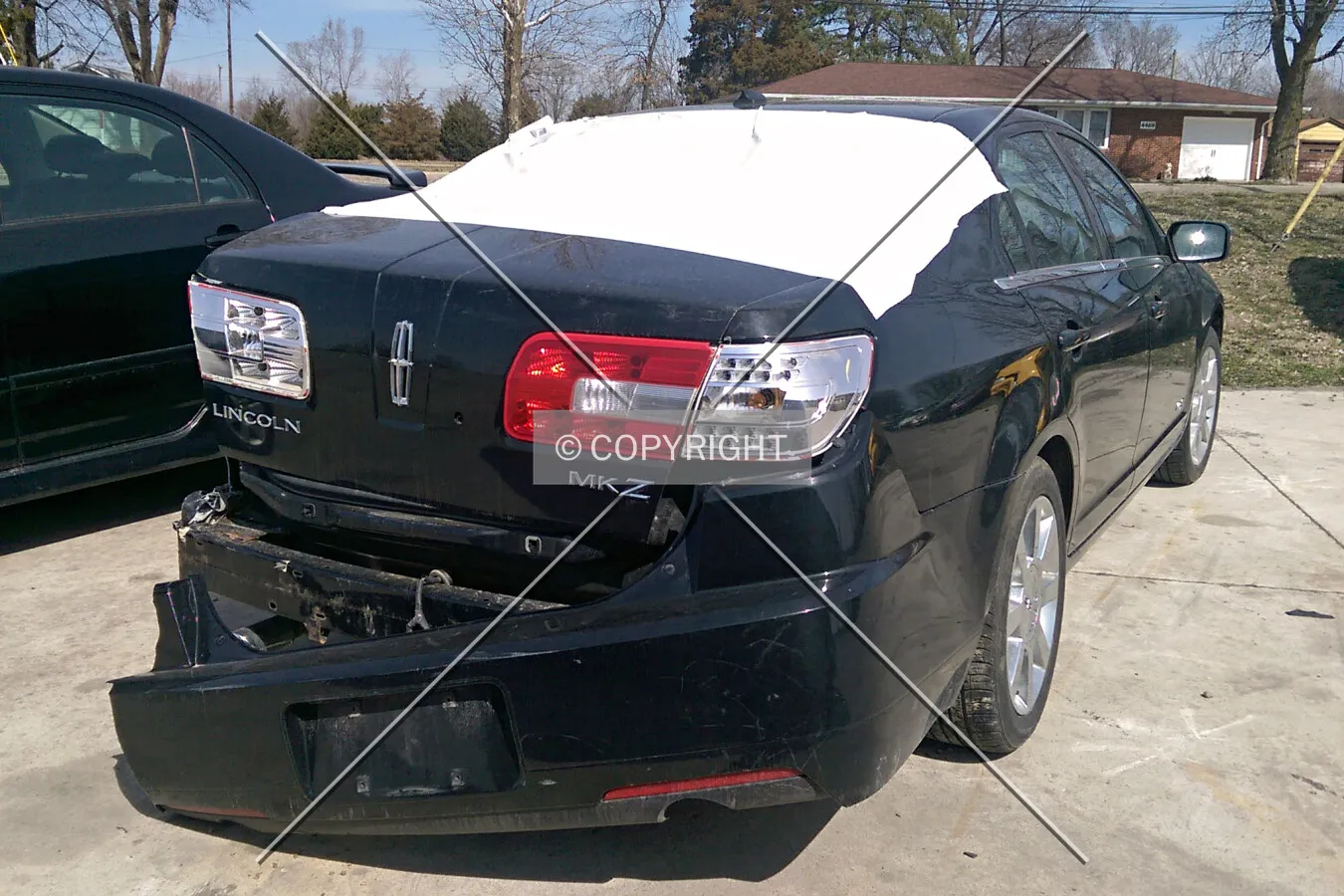 A damaged Lincoln MK-Z; March 21, 2015