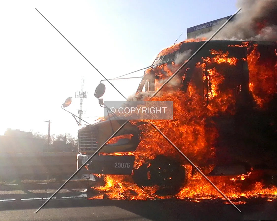 A school bus on fire