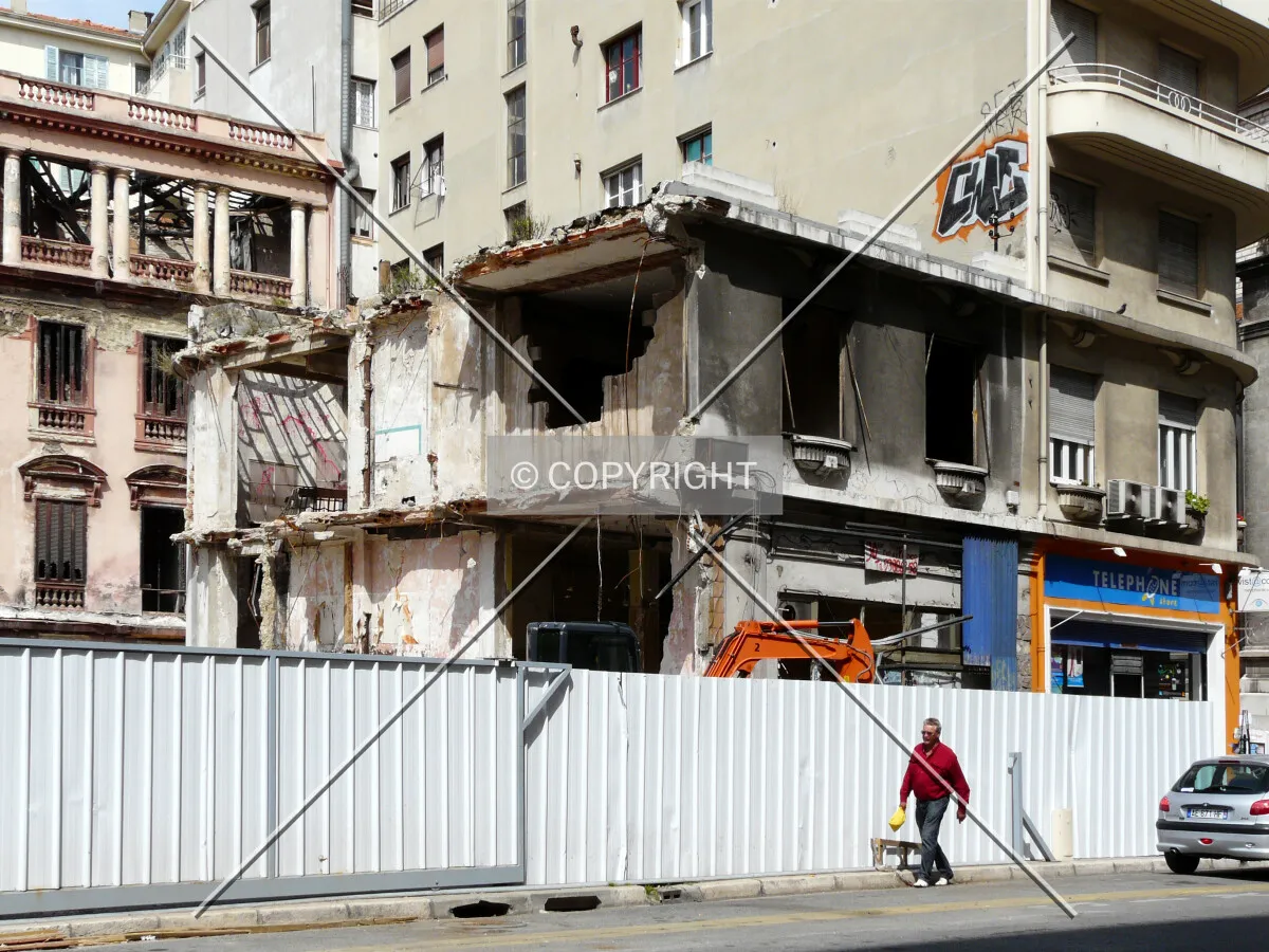 View during demolition, last part remaining along Rue de France