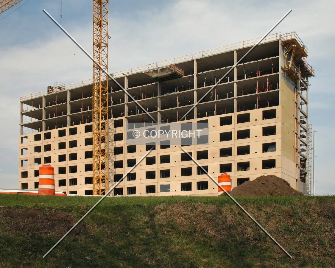 Southwest corner from below the curve in American Boulevard