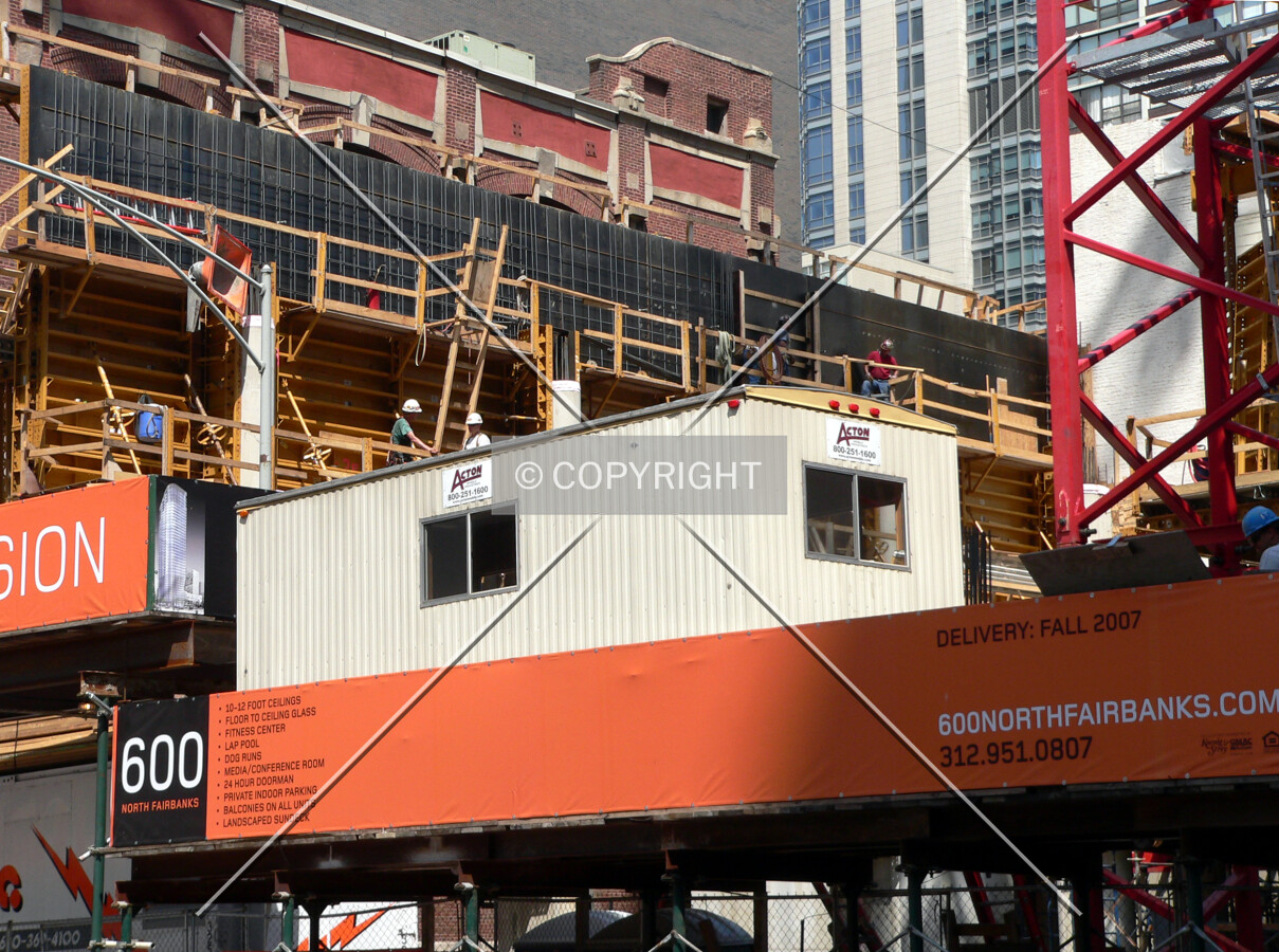 View to the northwest as the western structural wall is worked on