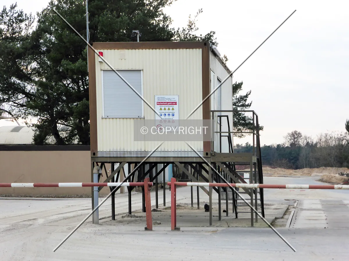 A container residing on a steel framework as foundation