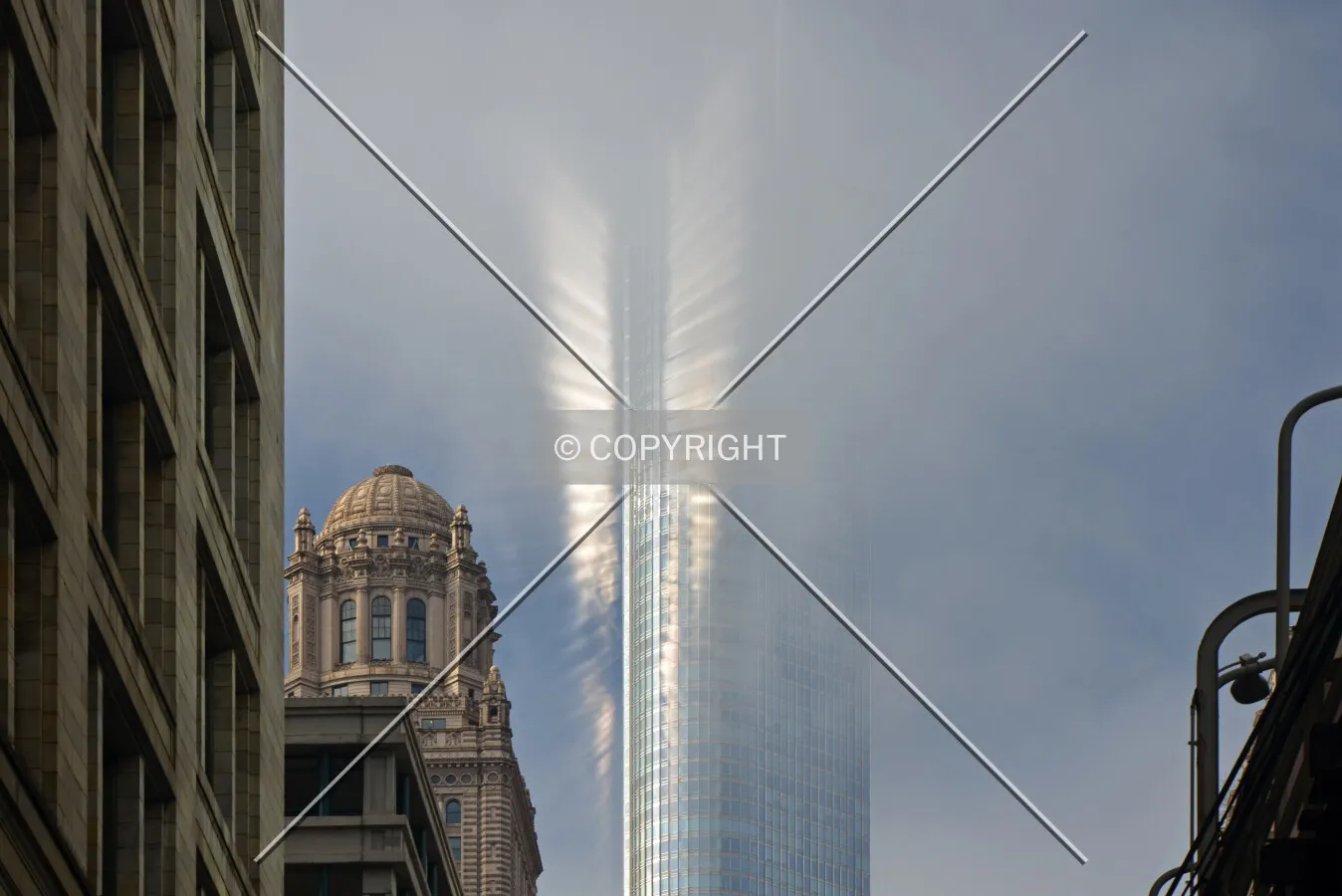 Solar reflections on a foggy day, viewed from North Wabash Avenue, April 28, 2013.